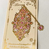 medieval lady and unicorn uk letterbox gift set with ornate gold and pink metal bookmark and tapestry style pouch in deep red tones