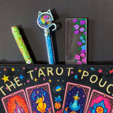 black and vibrant colours canvas tarot pouch featuring colourful tarot cards, crystal balls, candles, stars and moon and mystical symbols. Uk letterbox gifts shop.