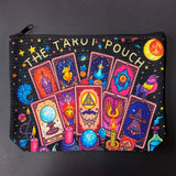 black and vibrant colours canvas tarot pouch featuring colourful tarot cards, crystal balls, candles, stars and moon and mystical symbols. Uk letterbox gifts shop.