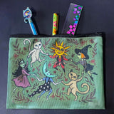 whimsical green blue zipper pouch featuring dancing cats, sun and moon characters, folk art inspired fairytale figures. witchy pencil case or journaling pouch. uk cute kawaii gifts shop.