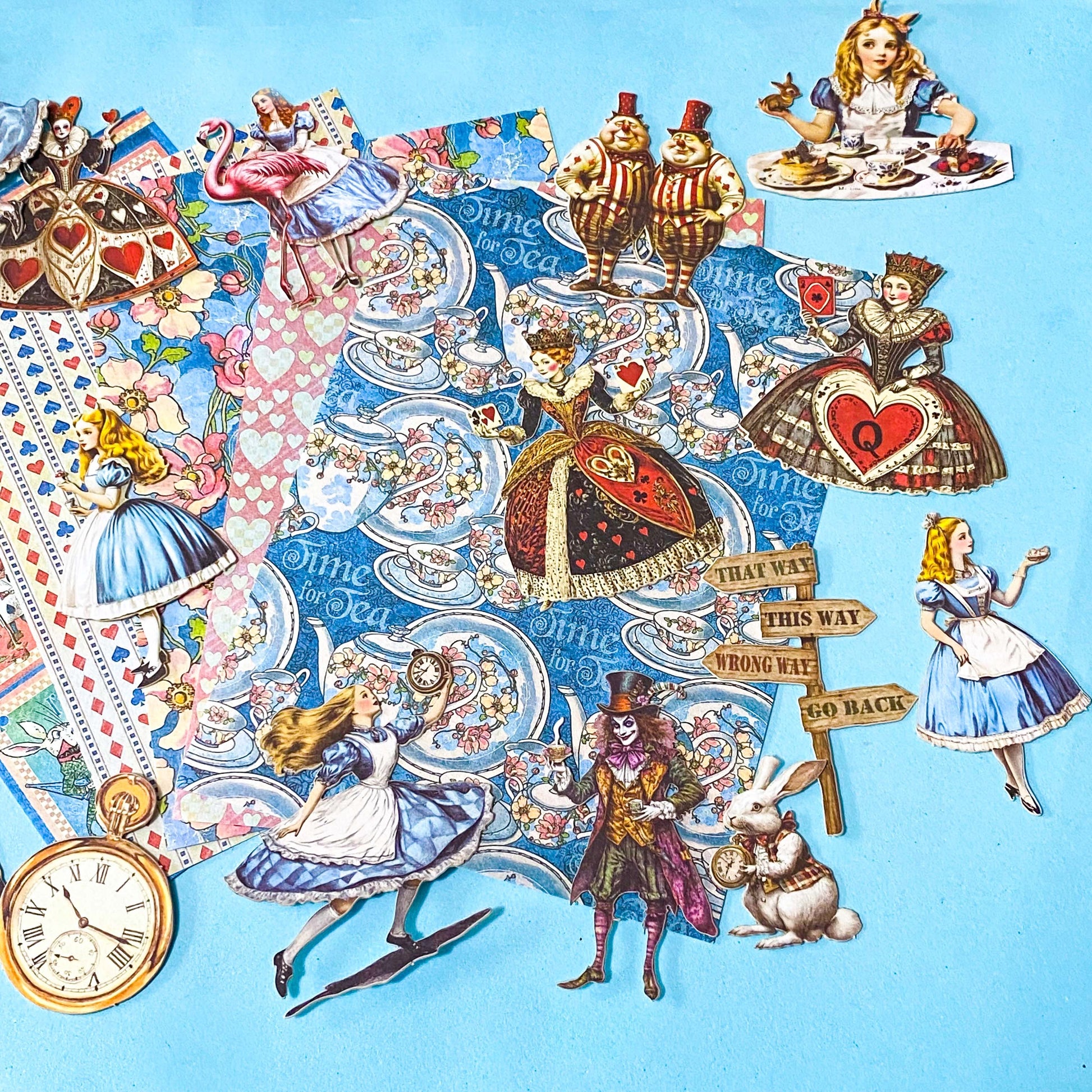 alice in wonderland ephemera sticker pack with scrapbook papers, die cut card stickers in a tea party theme with the write rabbit, queen of hearts, alice and cheshire cat decals