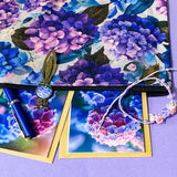 dark floral hydrangea gift set with textured large canvas pouch, owl hydrangea metal bookmark, crystal adjustable bracelet, blue metal pen and floral greetings cards with kraft envelopes. uk cute letterbox gifts shop. 