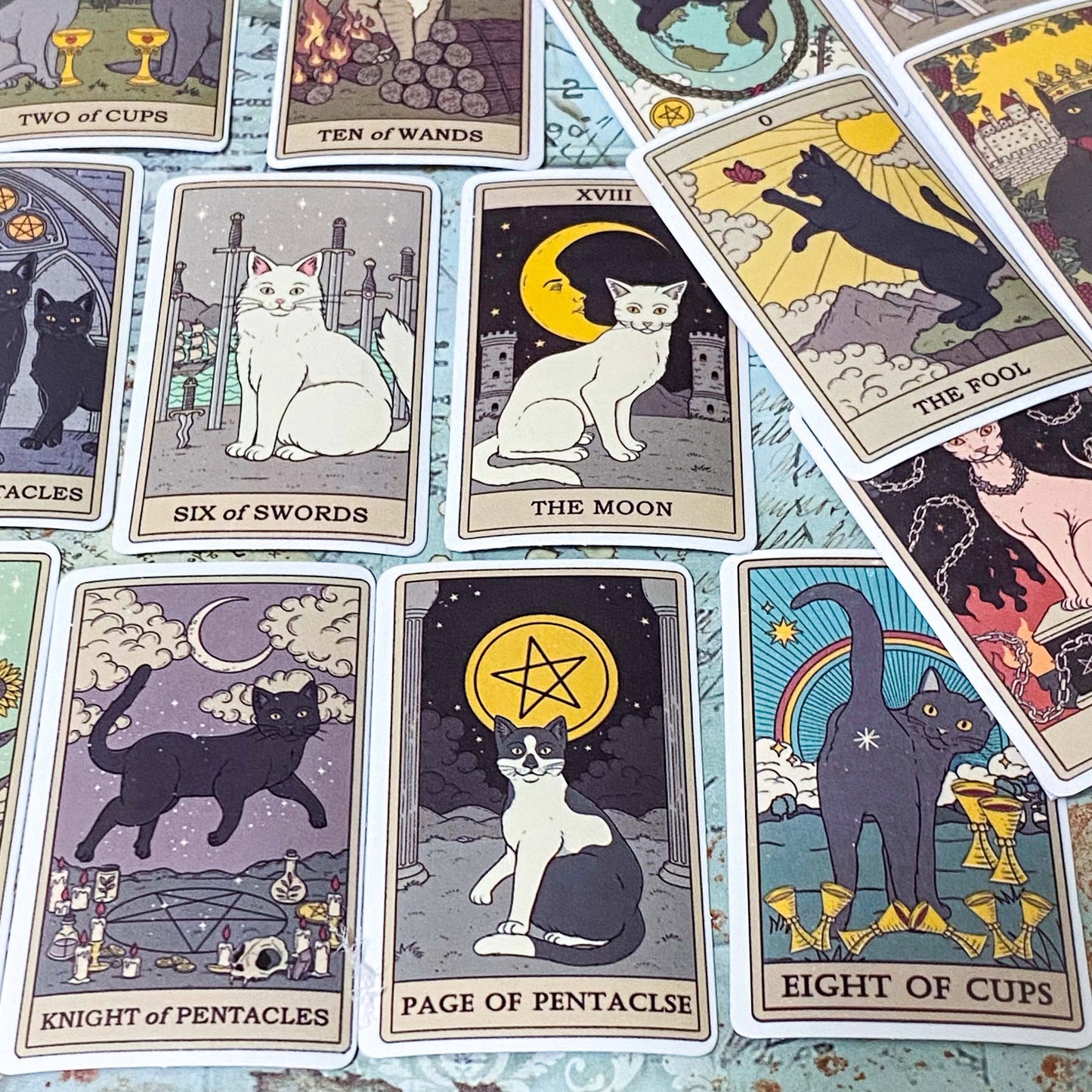 complete set of 78 cats tarot card stickers with matte finish and major and minor arcana including pentacles, swords, cups and wands and moon, emperor, death etc. uk mystical magical stationery gift.