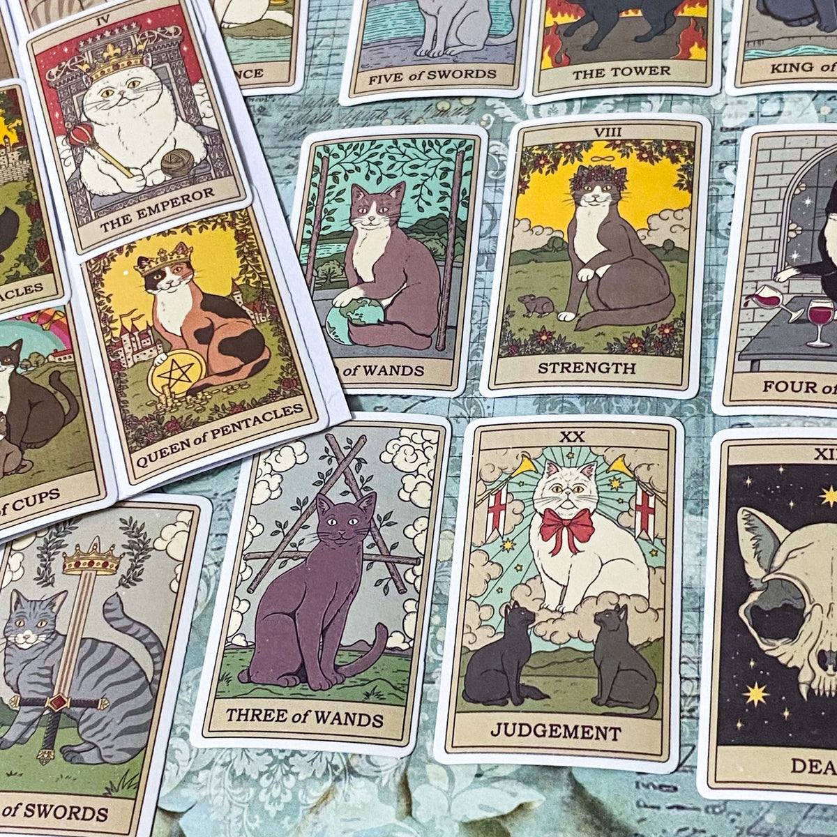 complete set of 78 cats tarot card stickers with matte finish and major and minor arcana including pentacles, swords, cups and wands and moon, emperor, death etc. uk mystical magical stationery gift.