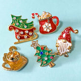 brooch brooches pin pins badge christmas festive sparkly rhinestone enamel enamelled gold golden metal pearl pearly pearls sledge sleigh gnome gonk gnomes tree trees hot chocolate mug cocoa red green uk cute kawaii stocking filler fillers gift gifts shop store