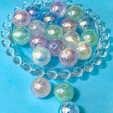 iridescent glow in the dark large round 15mm beads on a blue background