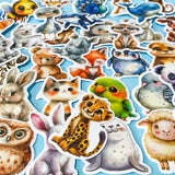 large cute and cuddle kawaii animals silk finish laptop stickers set of 50 on a pale blue background including a parrot, sheep, fox, bear and penguin