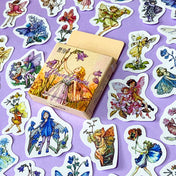 flower fairy sticker box of 46 mini fairies stickers with floral decorations on a lilac background