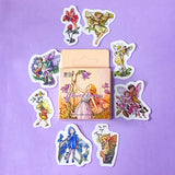 flower fairy sticker box of 46 mini fairies stickers with floral decorations on a lilac background