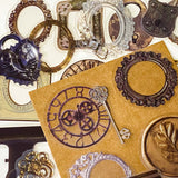 set of 68 vintage style clear PET stickers featuring ornate frames, antique keys, wax seals and clockwork designs in warm sepia tones on layered backing sheets