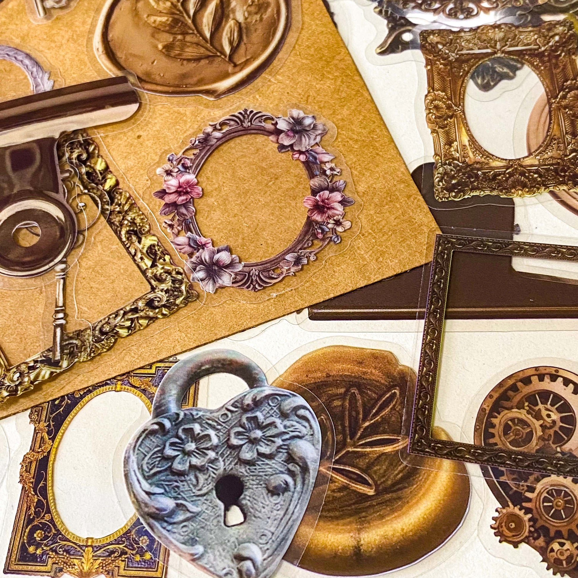 set of 68 vintage style clear PET stickers featuring ornate frames, antique keys, wax seals and clockwork designs in warm sepia tones on layered backing sheets