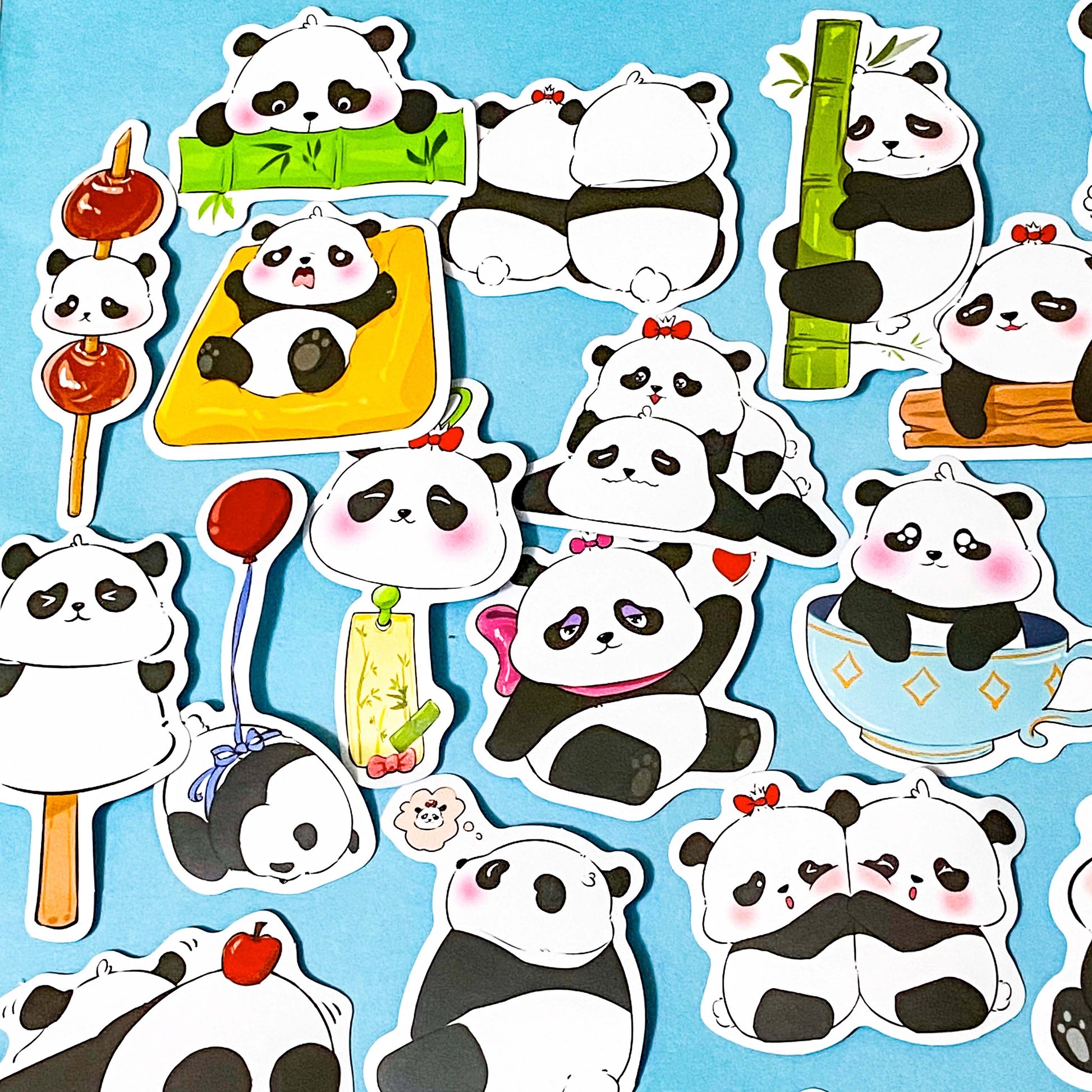 panda thick paper laptop stickers set of 5 on a blue background