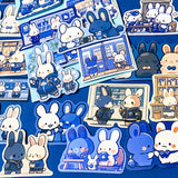 cosy blue cartoon bunny laptop stickers set on a dark blue background