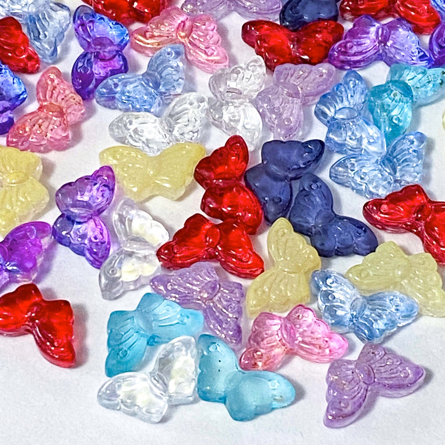 glass butterfly butterflies bead beads small 15mm colourful uk cute kawaii craft supplies shop jewellery making store blue lilac pink red yellow clear navy ombre pretty
