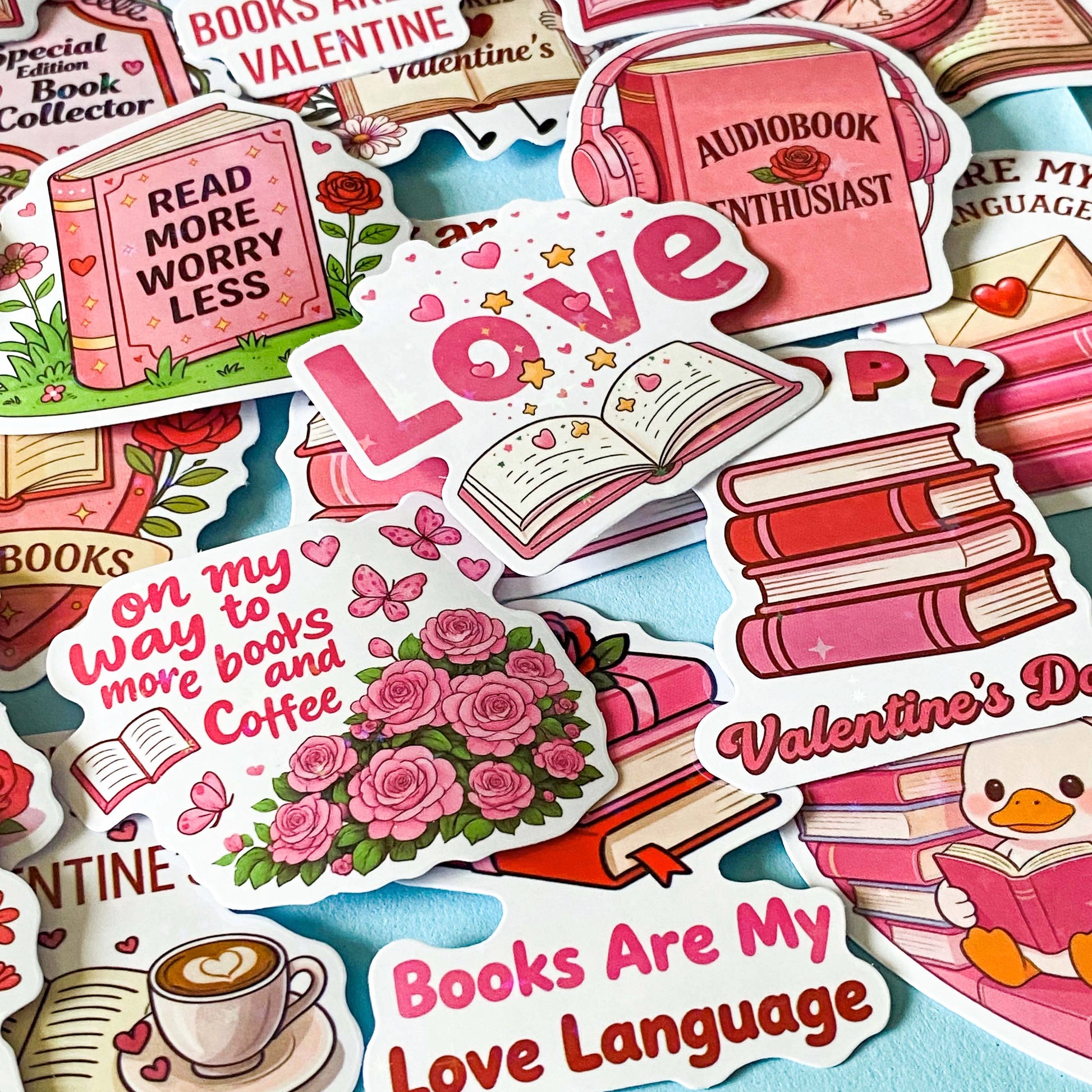 set of 52 stickers, book themed holographic stickers with pink and red designs featuring books, reading, animals , flowers and romantic bookish quotes 