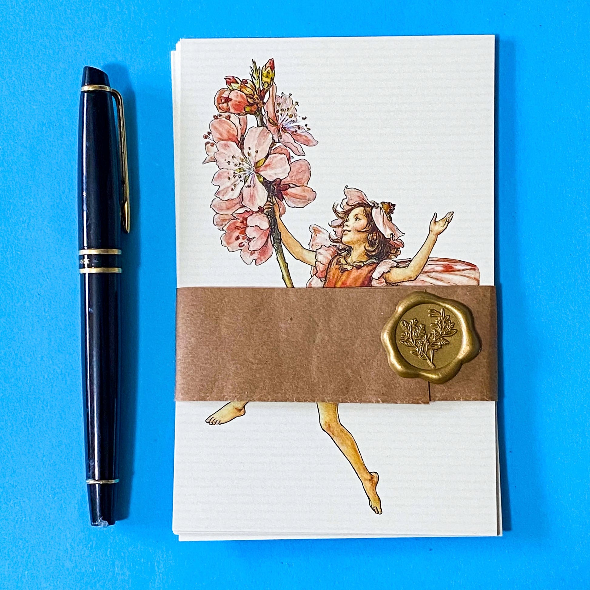 vintage flower fairy postcards with Spring blossoms including cherry tree, pear, laburnum and almond flowers. Presented in kraft belly band with wax seal sticker so makes beautiful uk letterbox gift.