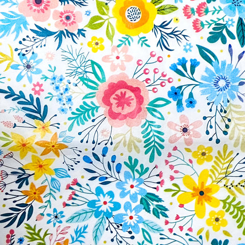 Colourful floral pattern tissue paper on a white background