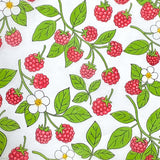 tissue paper with a red raspberries white flowers and green leaves pattern on a white background