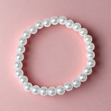 pastel pink white pearl pearly stretch elastic elasticated kids girl girls bracelet bracelets small uk cute kawaii cloud charm charms heart hearts glitter iridescent jewel colours gift gifts small