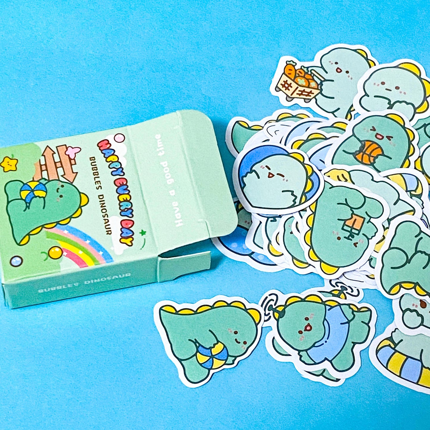 sticker pack with cute dinosaur design on a blue background