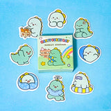 set of cute green dinosaur sticker flakes with a mini box on a blue background