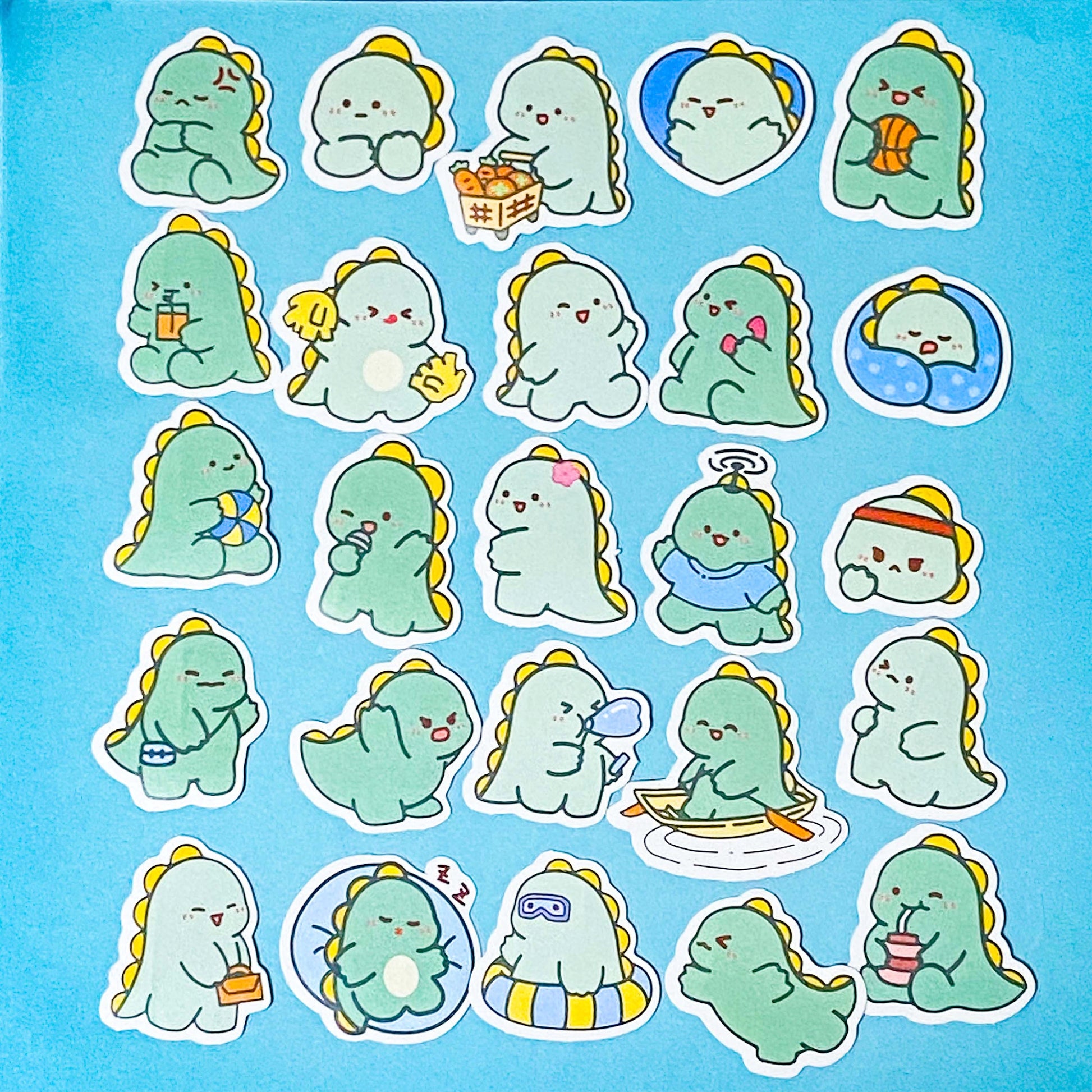 Collection of cute green dinosaur stickers on a blue background