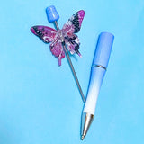 very large butterfly acrylic bead on a blue pen base