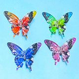 very large acrylic butterfly beads on a blue background