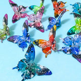 very large acrylic butterfly beads on a blue background