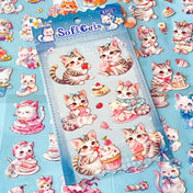pack of 6 kittens and cats clear plastic stickers on a pale blue background