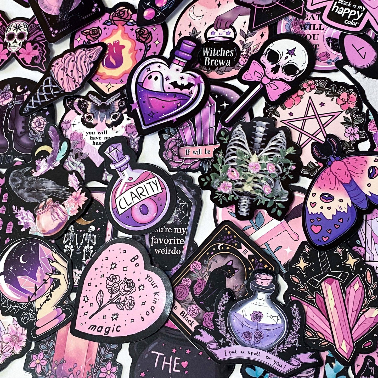 creepy cute spooky pink black purple halloween laptop sticker stickers set uk cute kawaii fun colourful skull skulls witch witches ribs potion bottle coffin coffins moth ghost ghosts cat black cats raven ravens crow crystal crystals moon moons haunted house skeleton skeletons