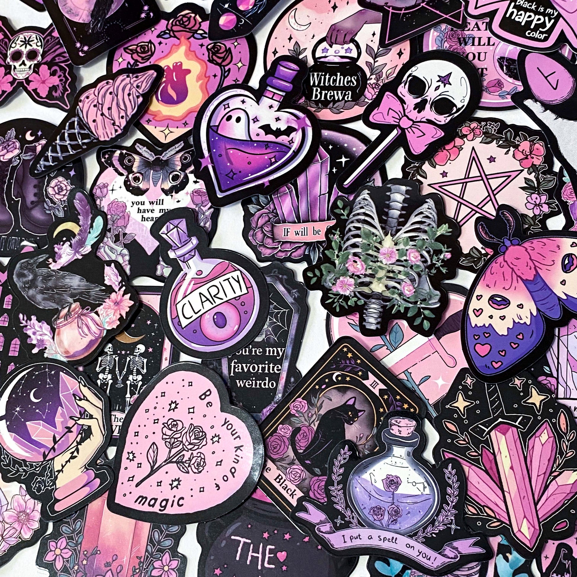 creepy cute spooky pink black purple halloween laptop sticker stickers set uk cute kawaii fun colourful skull skulls witch witches ribs potion bottle coffin coffins moth ghost ghosts cat black cats raven ravens crow crystal crystals moon moons haunted house skeleton skeletons