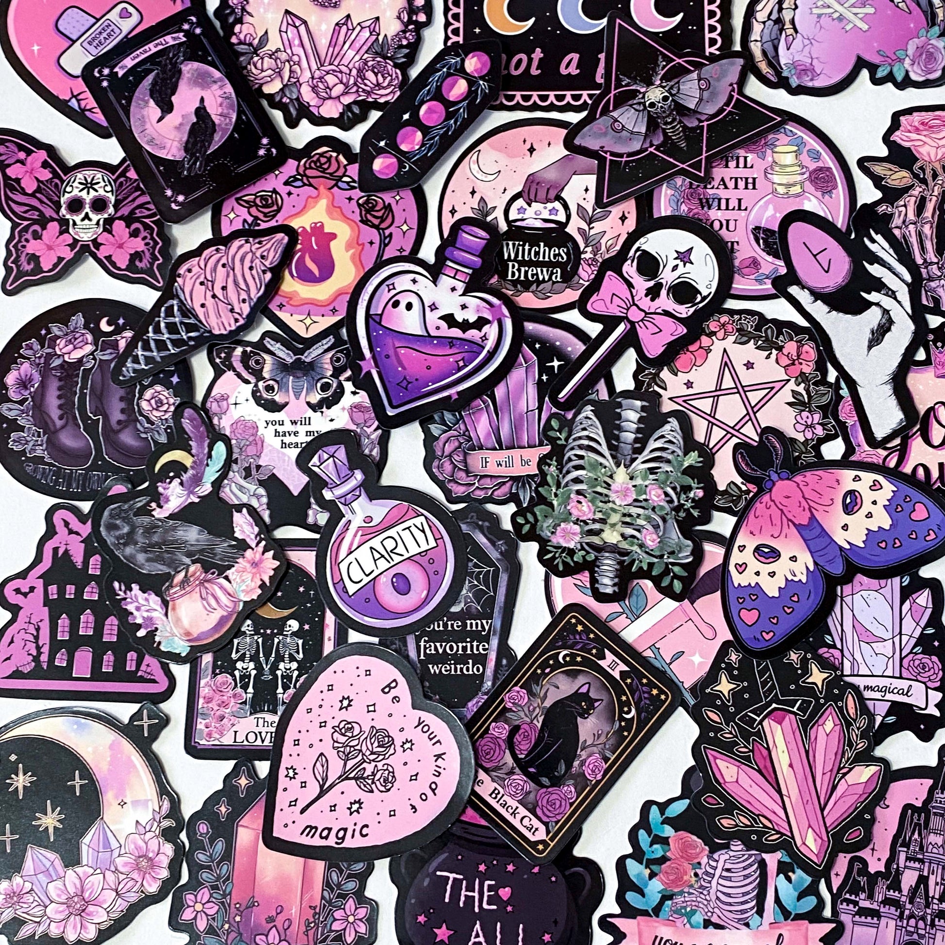 creepy cute spooky pink black purple halloween laptop sticker stickers set uk cute kawaii fun colourful skull skulls witch witches ribs potion bottle coffin coffins moth ghost ghosts cat black cats raven ravens crow crystal crystals moon moons haunted house skeleton skeletons