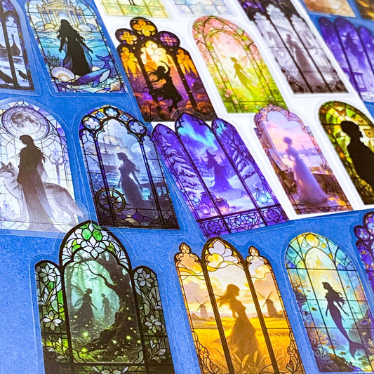 50 different storybook fairytale stained glass window stickers PET clear plastic. Scenes include fairies, witches, mermaids, castles, forests, pirates, enchanted  magical forests and oceans. uk sticker shop gift set.