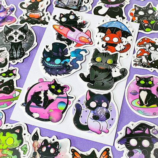 50 different kawaii matte paper cat stickers featuring magical black cats, witches, potions, planets, strawberries, spell books, cute fantasy night time illustrations. uk sticker gift shop.