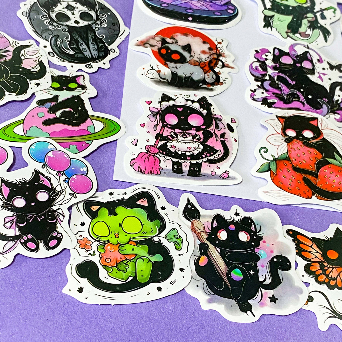 50 different kawaii matte paper cat stickers featuring magical black cats, witches, potions, mushrooms, moons, planets, strawberries, spell books, cute fantasy night time illustrations. uk sticker gift shop.