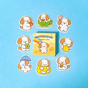 Set of 50 cute cartoon dog stickers with a small box labeled 'Happy Every Day Naughty Dog' on a blue background.