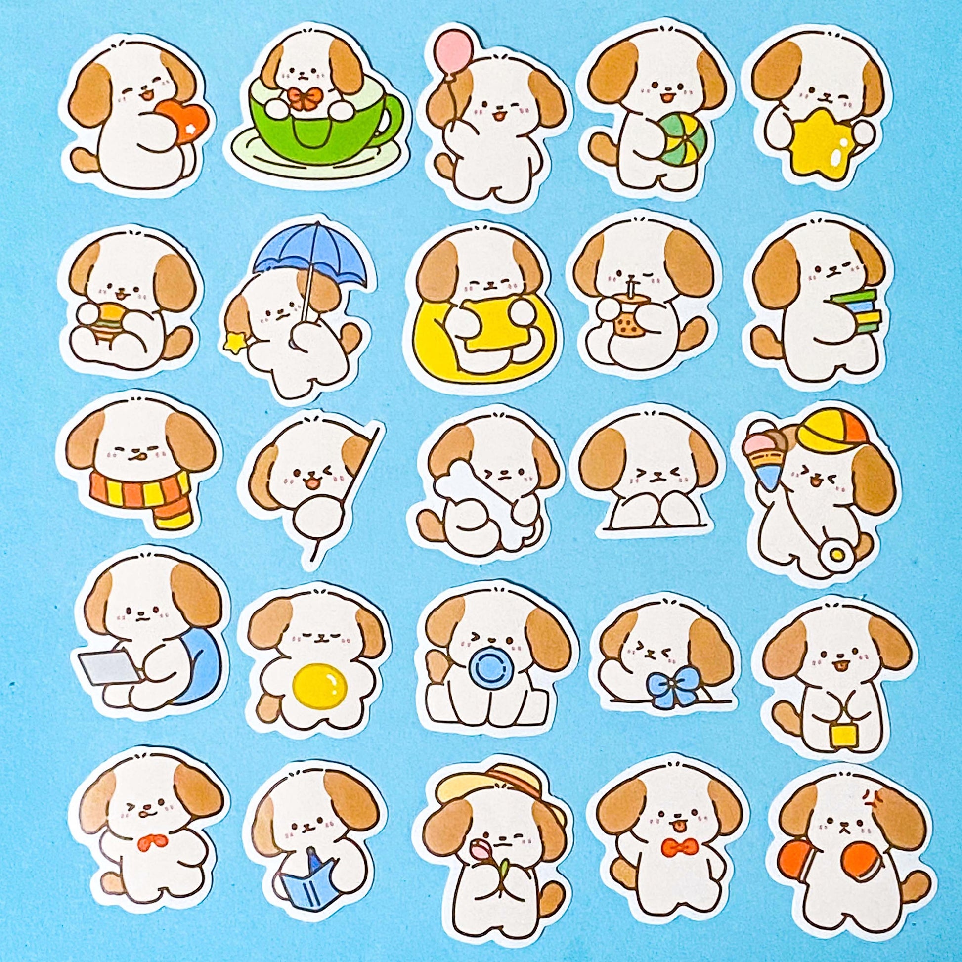 box of 50 cute puppy dog sticker flakes on a blue background