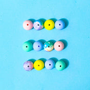 starry ombre pastel round 16mm silicone beads mixed set of 10 on a blue background