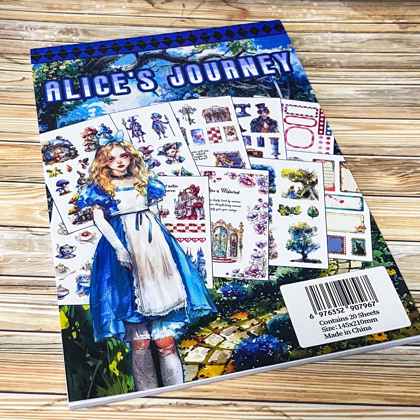 large Alice's Journey paper sticker book featuring 20 big matte pages of wonderland inspired fantasy stickers with castles, mushrooms, florals, vintage frames and blue fairytale illustrations