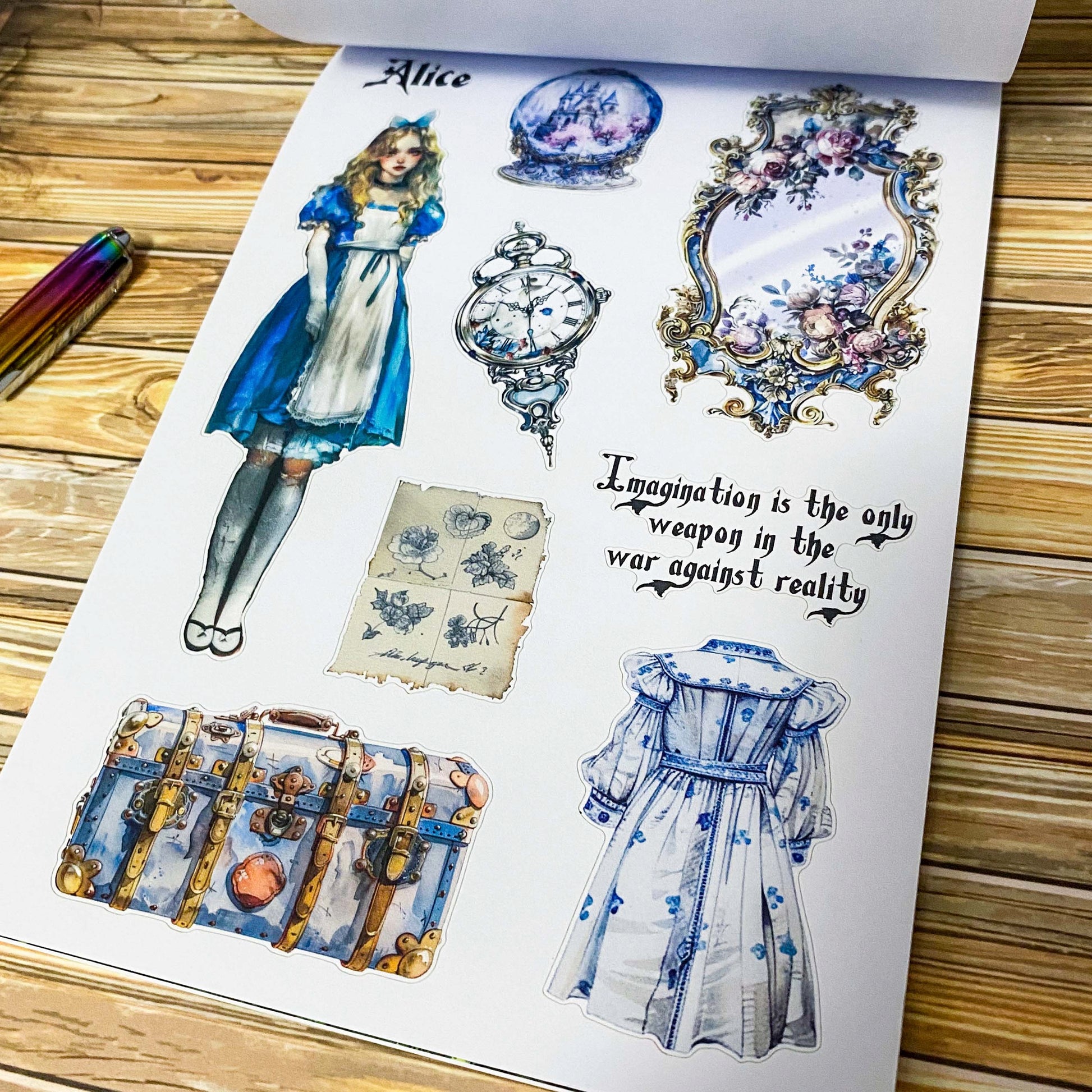 large Alice's Journey paper sticker book featuring 20 big matte pages of wonderland inspired fantasy stickers with castles, mushrooms, florals, vintage frames and blue fairytale illustrations