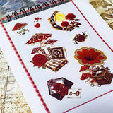 small spiral bound curiouser and curiouser alice clear PET sticker folio featuring fantasy stickers with mushrooms, roses, playing cards, rabbits and vintage gothic fairytale artwork