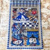 small spiral bound curiouser and curiouser alice clear PET sticker folio featuring fantasy stickers with mushrooms, roses, playing cards, rabbits and vintage gothic fairytale artwork