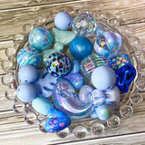 blue large acrylic and silicone beads bundle of 22. Perfect for making jewellery and beaded pens. Designs include dolphin, round, bow, heart and leaf. Uk cute craft supplies shop. 