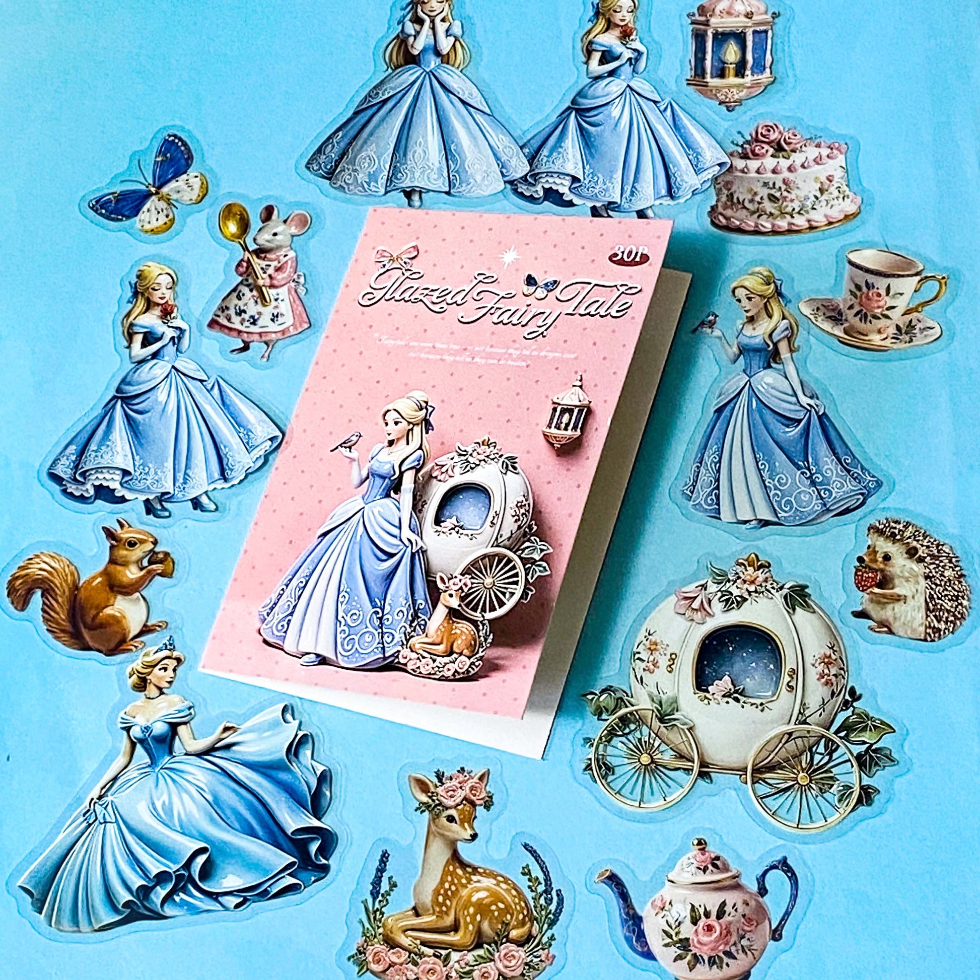 cinderella princess themed clear PET stickers pack of 30 with a glazed pottery glossy finish. Designs include cake, mouse, squirrel, deer, hedgehog and carriage. 