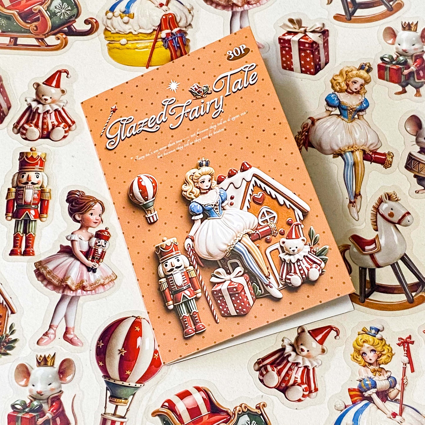 clara and the nutcracker suite clear PET large stickers with designs of toys including hot air balloon, doll, toy soldier, bear, rocking horse and mouse. Glazed effect so look like porcelain and glossy finish.