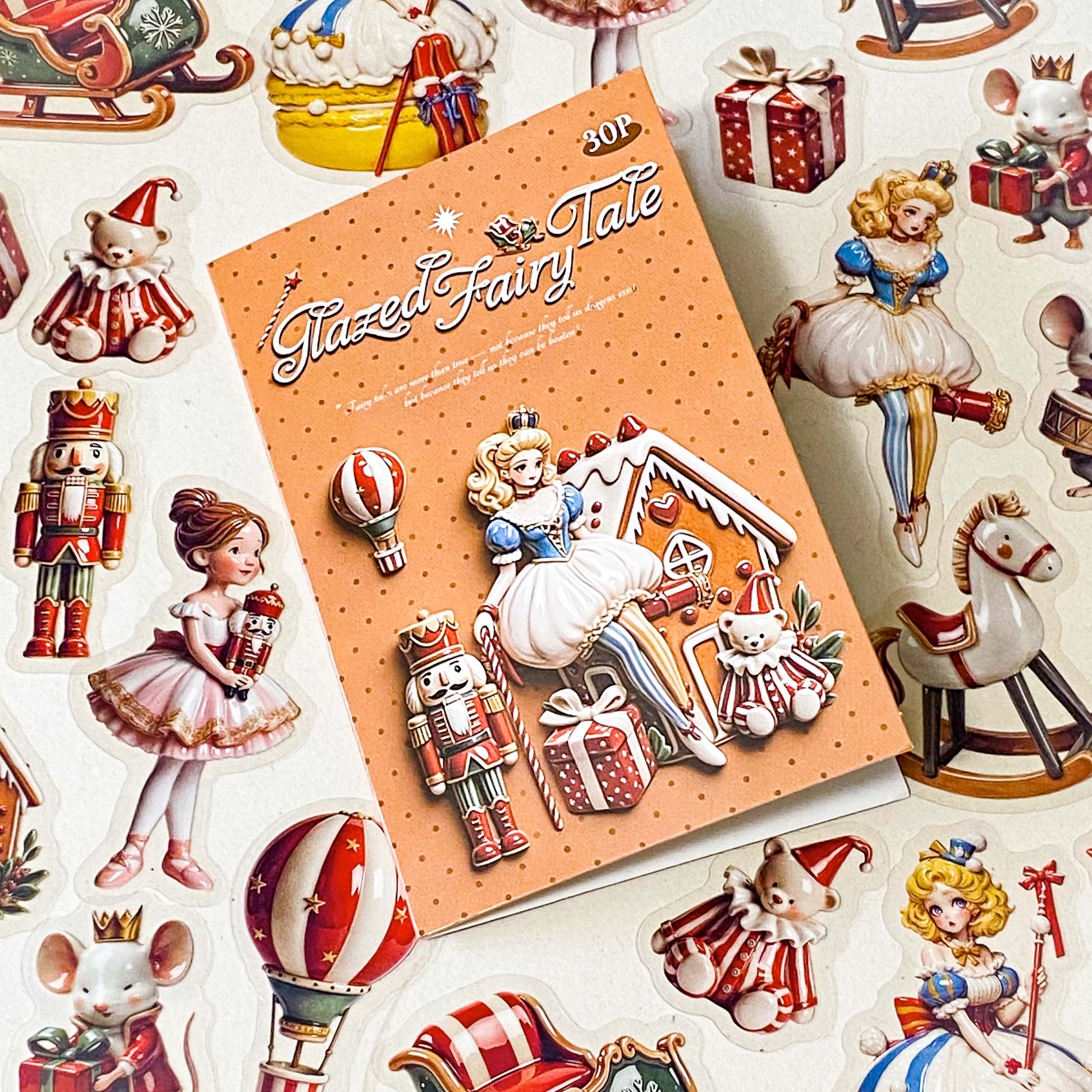 clara and the nutcracker suite clear PET large stickers with designs of toys including hot air balloon, doll, toy soldier, bear, rocking horse and mouse. Glazed effect so look like porcelain and glossy finish.