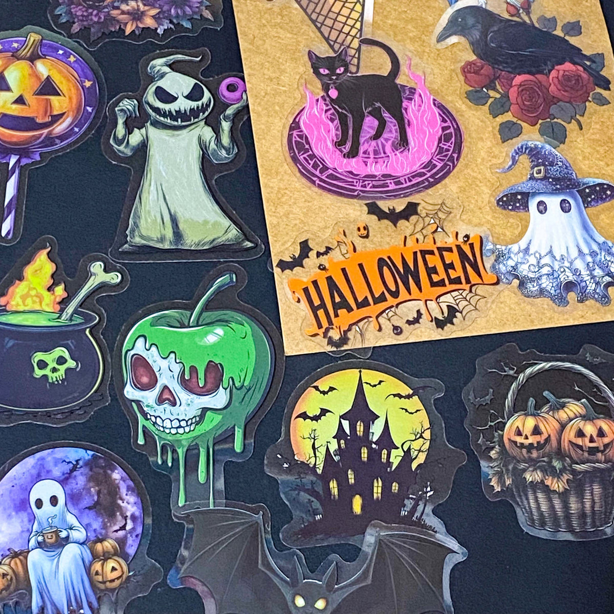 50 different halloween pET STICKERS UP TO 67MM, FEATURING PUMPKINS, GHOSTS, SKELETONS, BLACK CATS, RAVENS, POTIONS, SPOOKY GOTHIC ILLUSTRATIONS. Uk cute stationery gift shop. purple, orange and black.