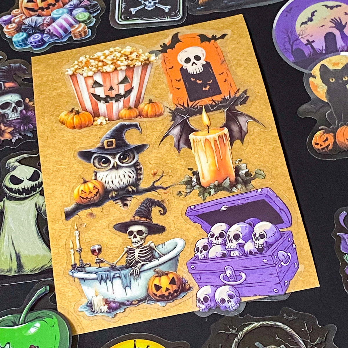 50 different halloween pET STICKERS UP TO 67MM, FEATURING PUMPKINS, GHOSTS, SKELETONS, BLACK CATS, RAVENS, POTIONS, SPOOKY GOTHIC ILLUSTRATIONS. Uk cute stationery gift shop. purple, orange and black.