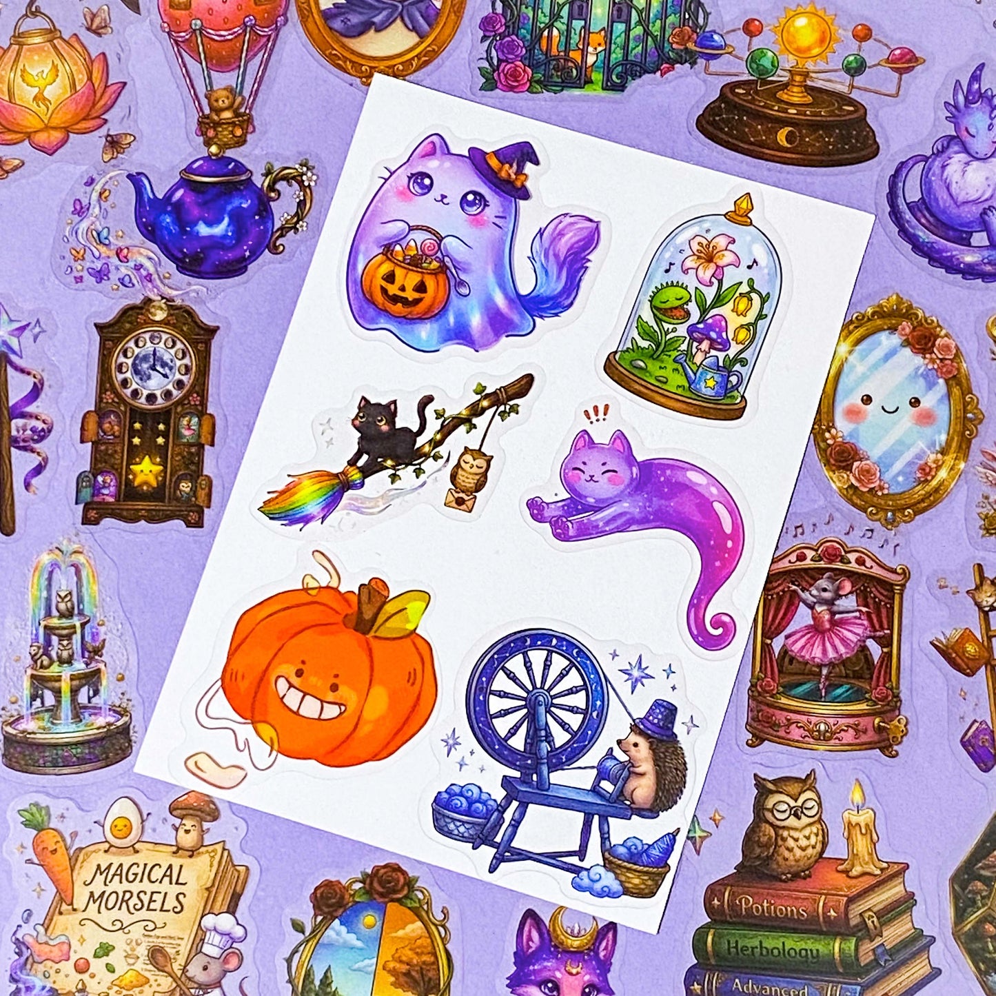 a pocketful of magic pet clear stickers, 50 different halloween and witchy designs including magical cats, potion books, celestial creatures, pumpkins, animals, owls, clocks and enchanted objects, uk cute and kawaii stationery shop.